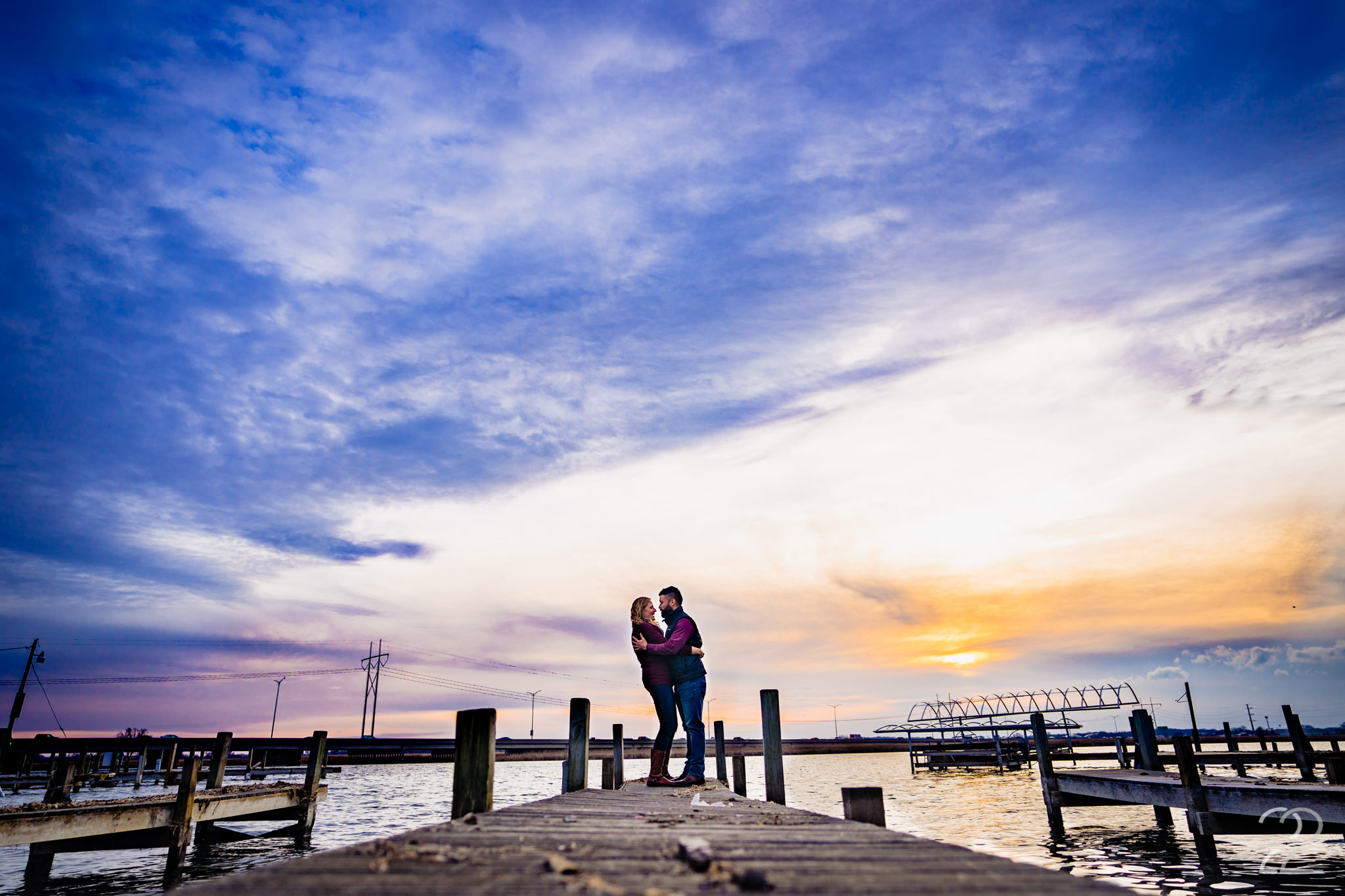  Waterfront views, a cuddly couple and a Madison Wisconsin autumn sunset are the perfect recipe for a piece of art. Megan says an extra word of thanks when nature graces her with something extra special when shooting a couple’s shoot. 